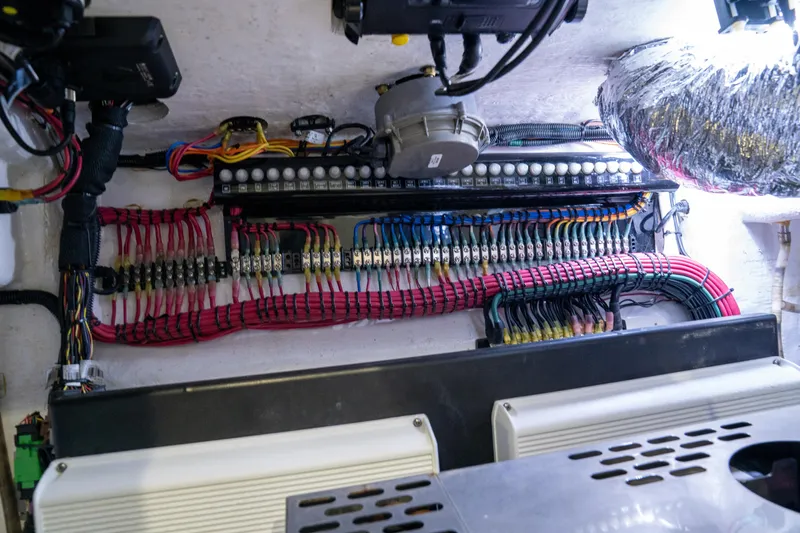 Pharma-sea Yacht Photos Pics Electrical wiring system in 2023 Contender 44 CB boat, showcasing organized cables and components.