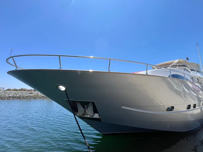 Endless Romance Yacht Photos Pics Luxury Astondoa 95GLX yacht from 2001, docked under clear blue sky.