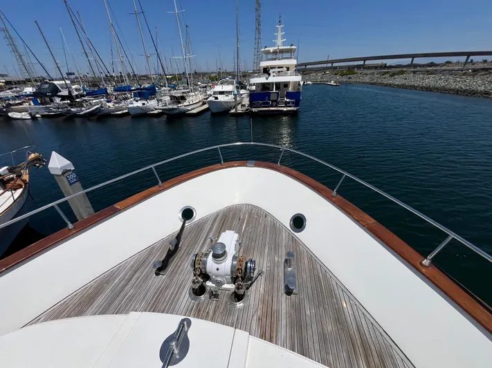 Endless Romance Yacht Photos Pics Bow view of 2001 Astondoa 95GLX yacht docked in a marina.
