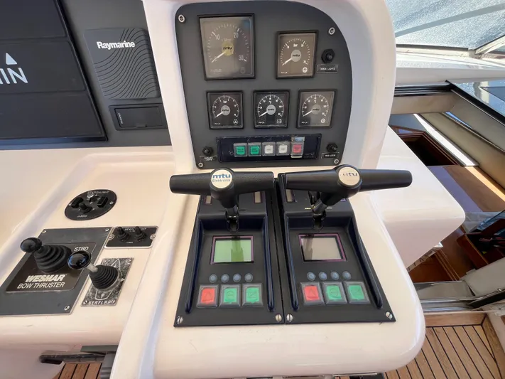 Endless Romance Yacht Photos Pics Control panel of a 2001 Astondoa 95GLX yacht with MTU and Raymarine systems.