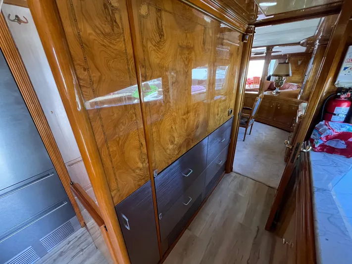 Endless Romance Yacht Photos Pics Luxurious interior of 2001 Astondoa 95GLX yacht with polished wood finishes.