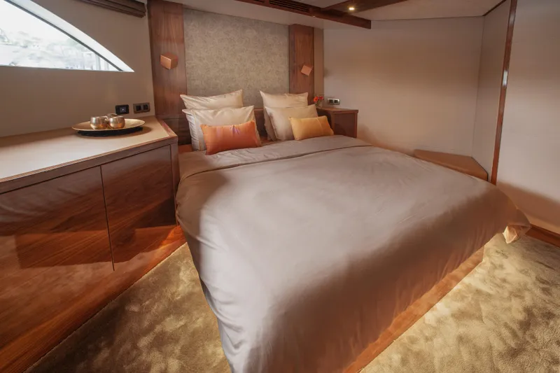  Yacht Photos Pics Luxurious bedroom interior of 2019 Van den Hoven Executive 2100 yacht.