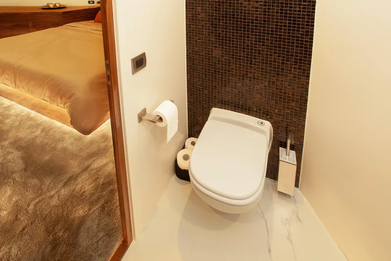  Yacht Photos Pics Modern bathroom in Van den Hoven Executive 2100 yacht, 2019 model, with adjacent bedroom.