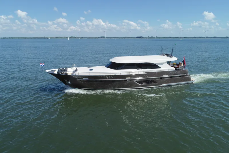  Yacht Photos Pics 2019 Van den Hoven Executive 2100 yacht cruising on open water.