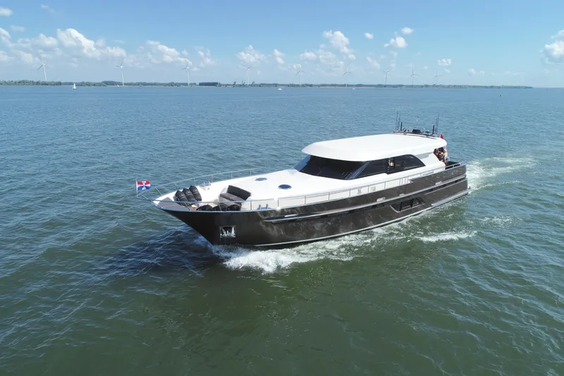  Yacht Photos Pics 2019 Van den Hoven Executive 2100 yacht cruising on open water.