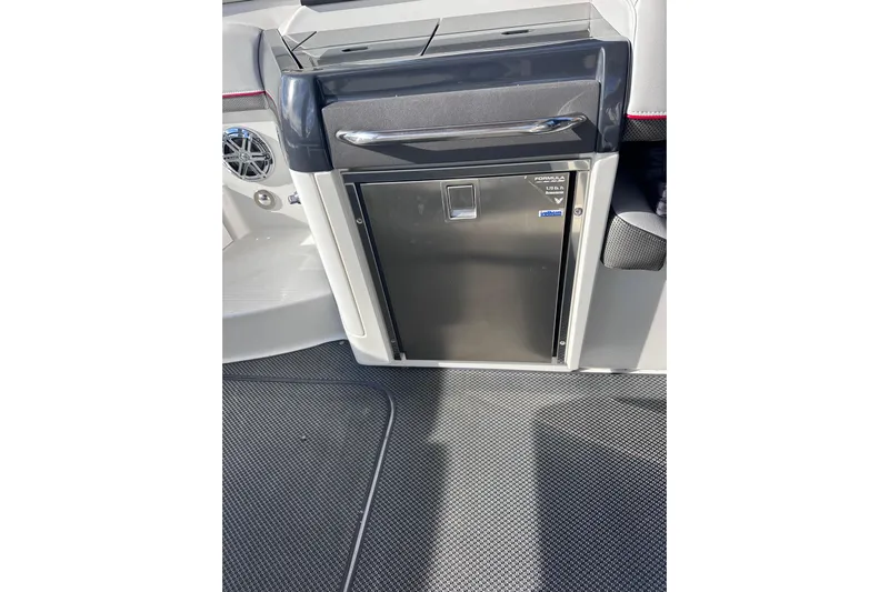  Yacht Photos Pics 2019 Formula 310 Bowrider interior with built-in refrigerator and speaker.