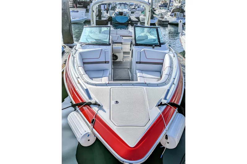  Yacht Photos Pics 2019 Formula 310 Bowrider boat with red accents docked in marina.