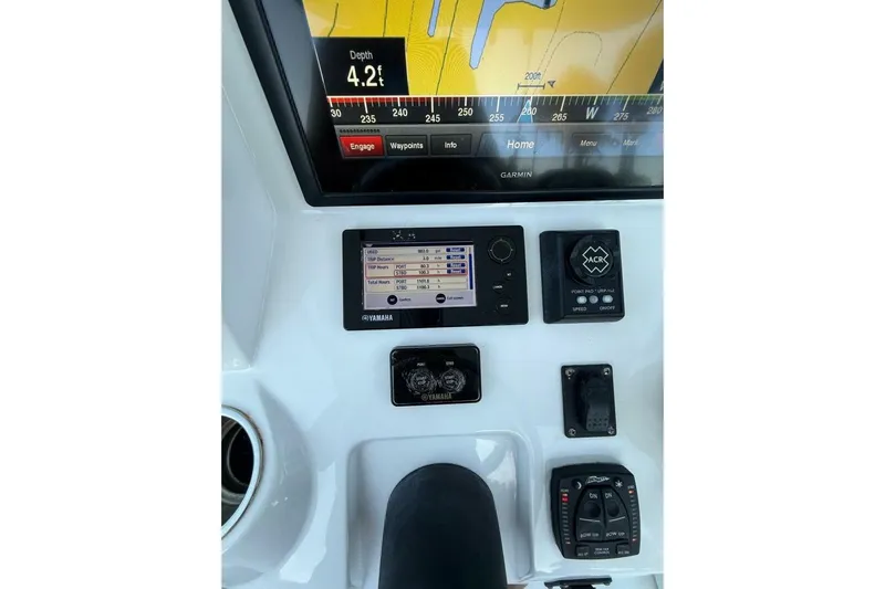 Insignia Yacht Photos Pics Control panel of a 2015 Intrepid 327 Cuddy boat with Garmin and Yamaha displays.