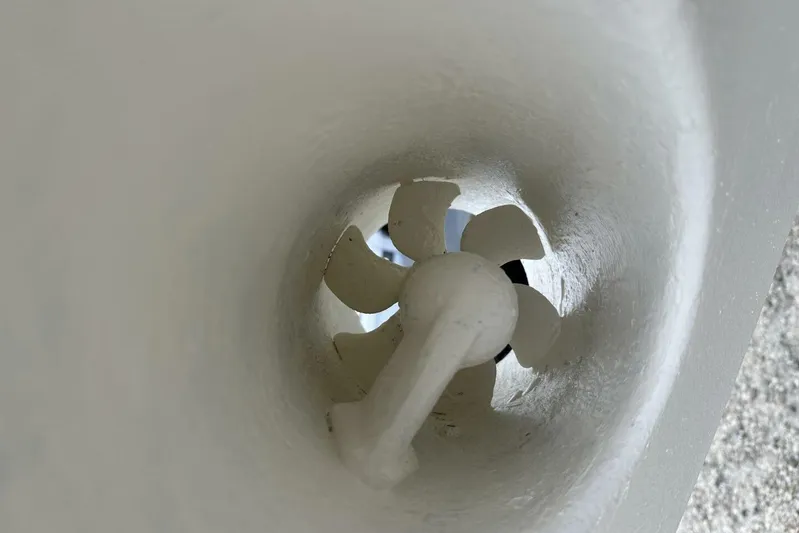 Insignia Yacht Photos Pics Close-up of a 2015 Intrepid 327 Cuddy boat's bow thruster propeller.