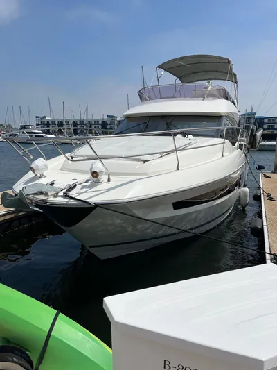 Simorgh Yacht Photos Pics 2019 Prestige 460 yacht docked at a marina.