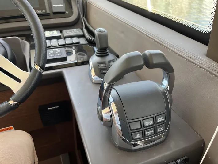 Simorgh Yacht Photos Pics Prestige 460 2019 yacht helm controls and steering wheel.