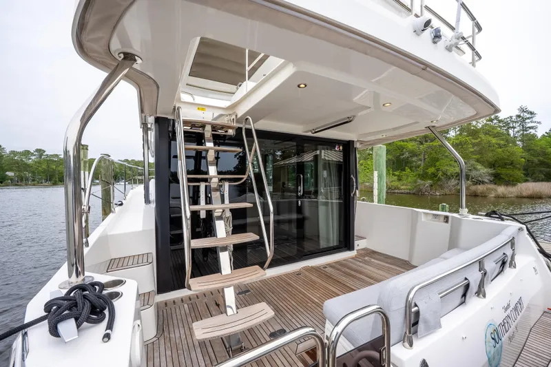 Sweetest Southern Comfort Yacht Photos Pics 2022 Beneteau ST48 Swift Trawler 48, spacious deck with modern design and water view.