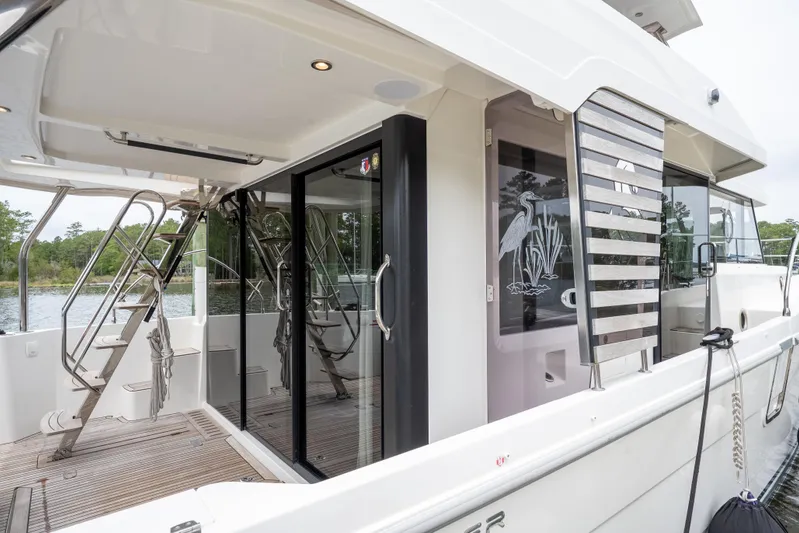 Sweetest Southern Comfort Yacht Photos Pics 2022 Beneteau ST48 Swift Trawler 48, exterior view with modern design and spacious deck.