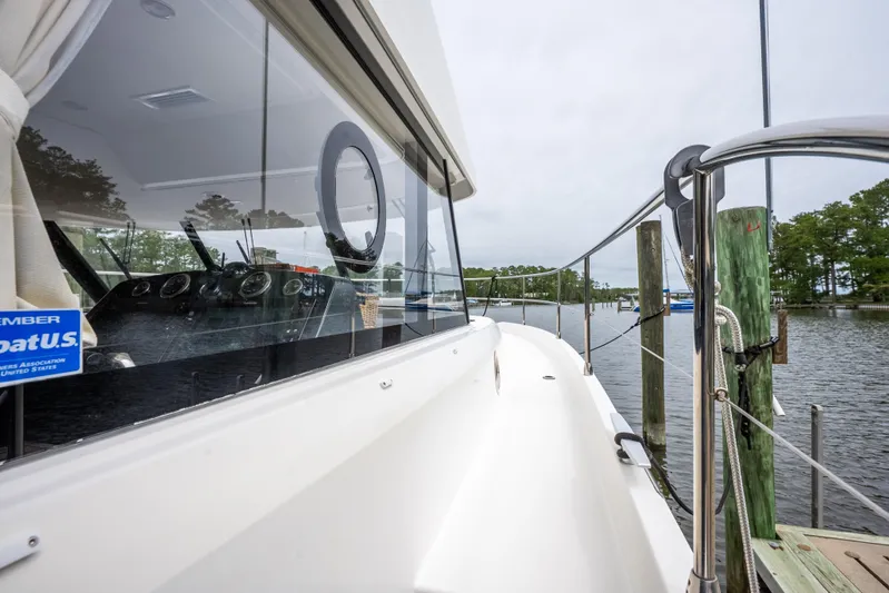 Sweetest Southern Comfort Yacht Photos Pics 2022 Beneteau ST48 Swift Trawler docked, showcasing sleek design and modern features.