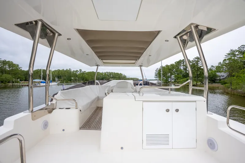 Sweetest Southern Comfort Yacht Photos Pics 2022 Beneteau ST48 Swift Trawler 48, spacious deck with sleek design and modern amenities.