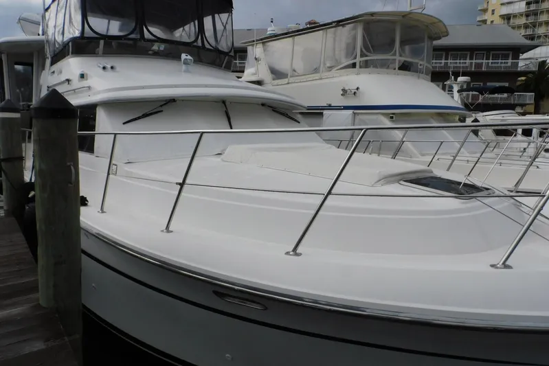 La Vida Yacht Photos Pics 1993 Carver 445 Aft Cabin Motor Yacht docked at marina, side view.