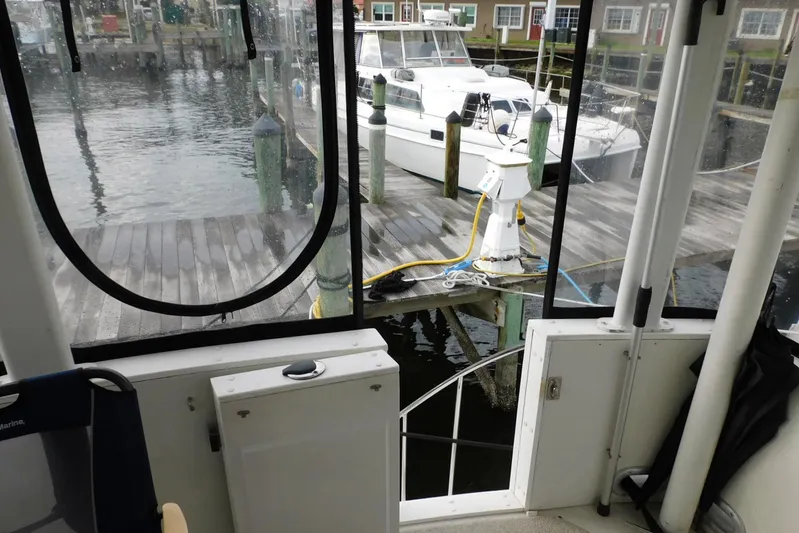 La Vida Yacht Photos Pics 1993 Carver 445 Aft Cabin Motor Yacht docked at marina, view from interior.