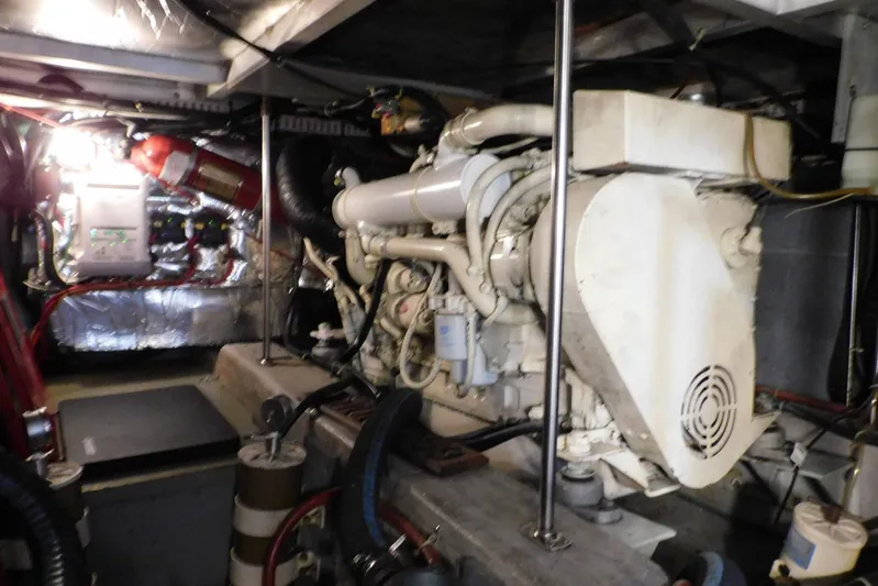 La Vida Yacht Photos Pics Engine room of 1993 Carver 445 Aft Cabin Motor Yacht, featuring mechanical components.
