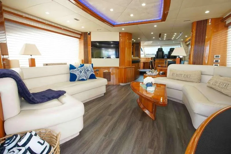 Fins Up Yacht Photos Pics Luxurious interior of 2006 Sunseeker Manhattan Motor 82 yacht with elegant seating and decor.