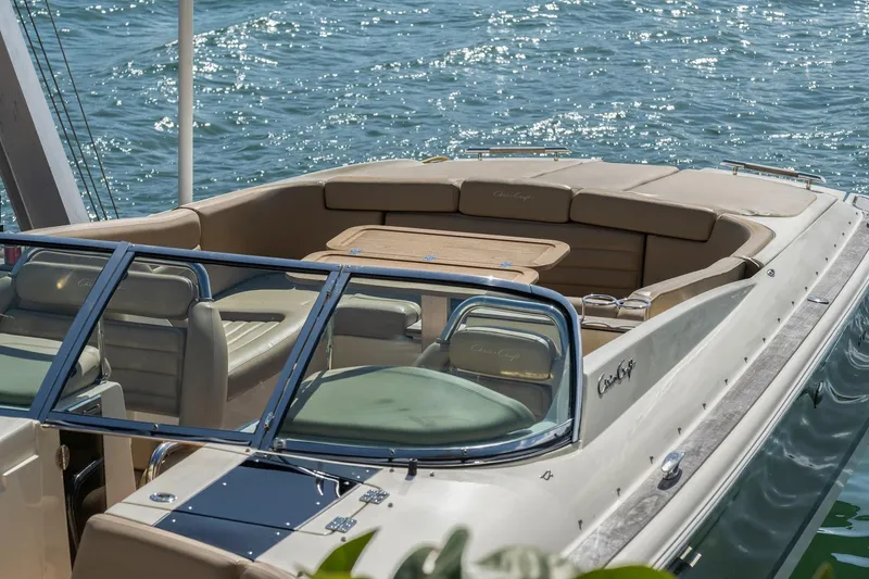 Chris-craft Launch 32 Yacht Photos Pics 2013 Chris-Craft Launch 32 boat on water, featuring elegant seating and sleek design.