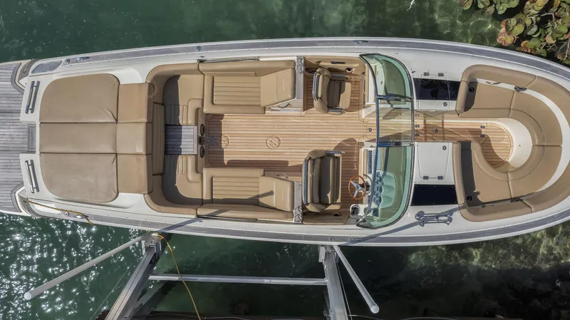 Chris-craft Launch 32 Yacht Photos Pics Overhead view of 2013 Chris-Craft Launch 32 boat docked in clear water.