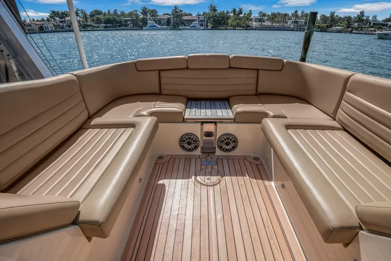 Chris-craft Launch 32 Yacht Photos Pics Luxurious 2013 Chris-Craft Launch 32 boat interior with tan leather seating and wooden deck.