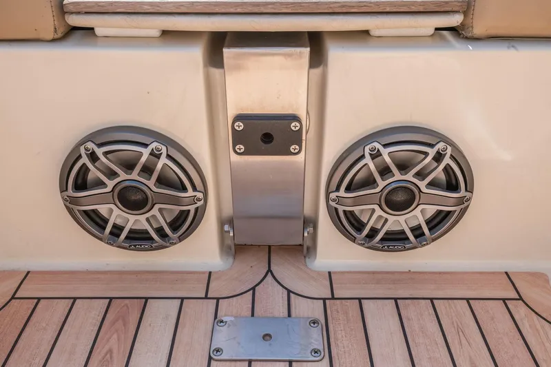 Chris-craft Launch 32 Yacht Photos Pics 2013 Chris-Craft Launch 32 boat speakers on teak deck, showcasing premium marine audio system.