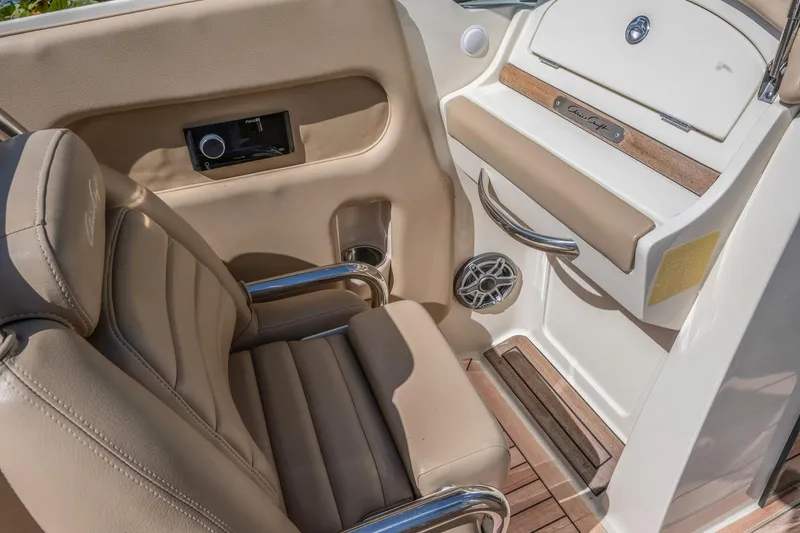 Chris-craft Launch 32 Yacht Photos Pics 2013 Chris-Craft Launch 32 interior with beige seating and wood accents.