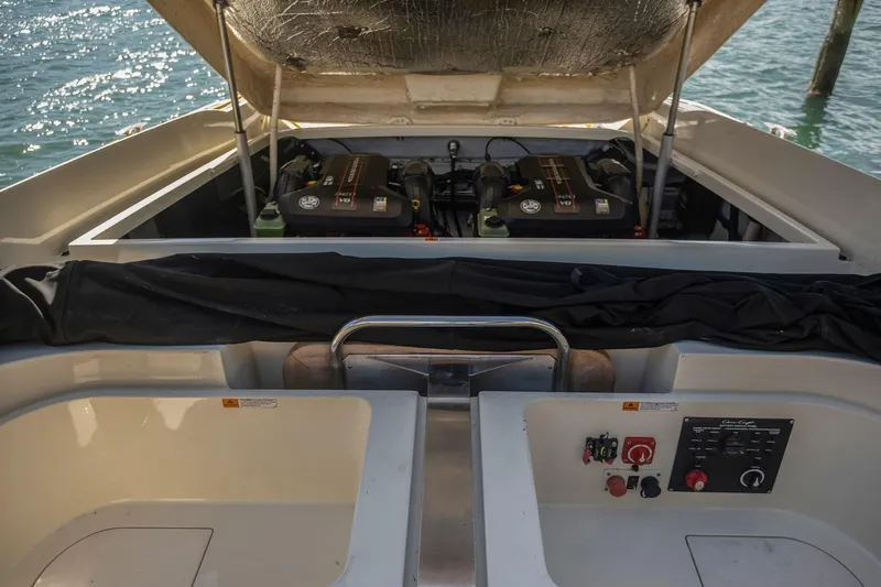 Chris-craft Launch 32 Yacht Photos Pics 2013 Chris-Craft Launch 32 engine compartment with open hatch, revealing dual engines.