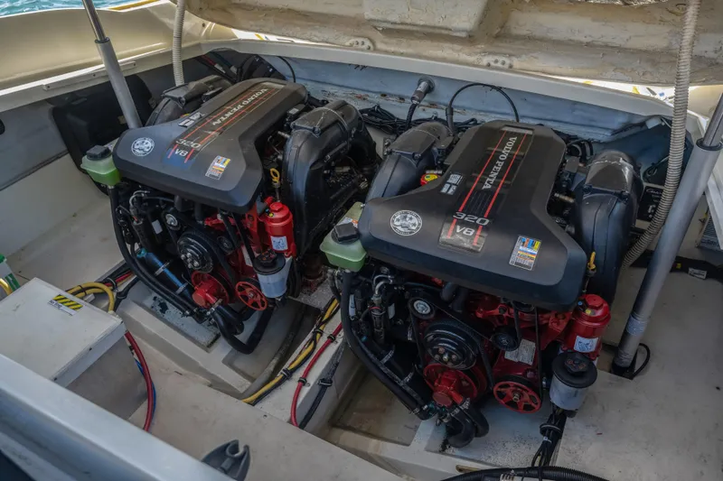 Chris-craft Launch 32 Yacht Photos Pics Twin engines in a 2013 Chris-Craft Launch 32 boat, showcasing powerful marine engineering.