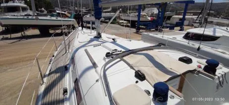  Yacht Photos Pics Beneteau Oceanis Clipper 393 sailboat on dry dock, 2006 model, viewed from deck.