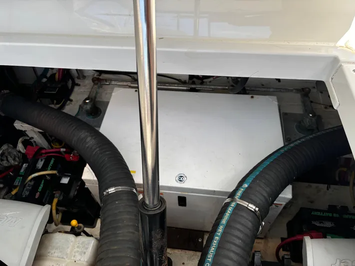  Yacht Photos Pics Engine compartment of 2011 Cruisers Yachts 330 Express with visible hoses and components.