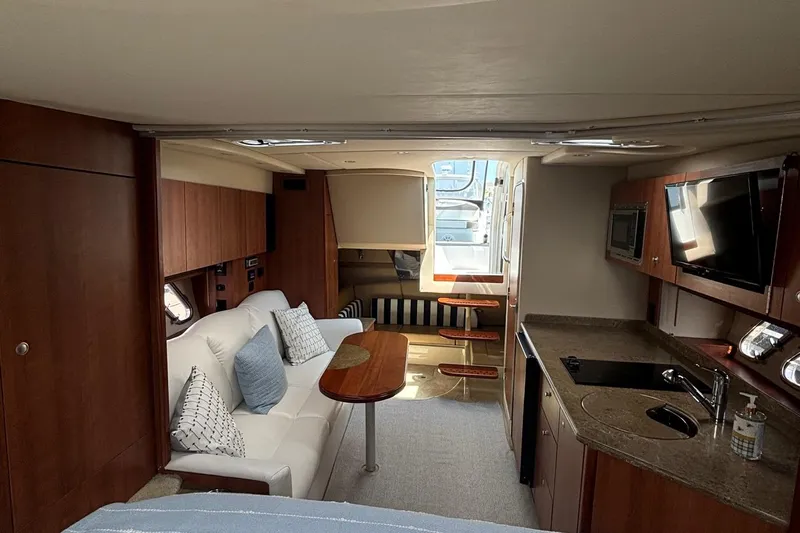  Yacht Photos Pics Luxurious interior of 2011 Cruisers Yachts 330 Express with modern amenities and cozy seating.