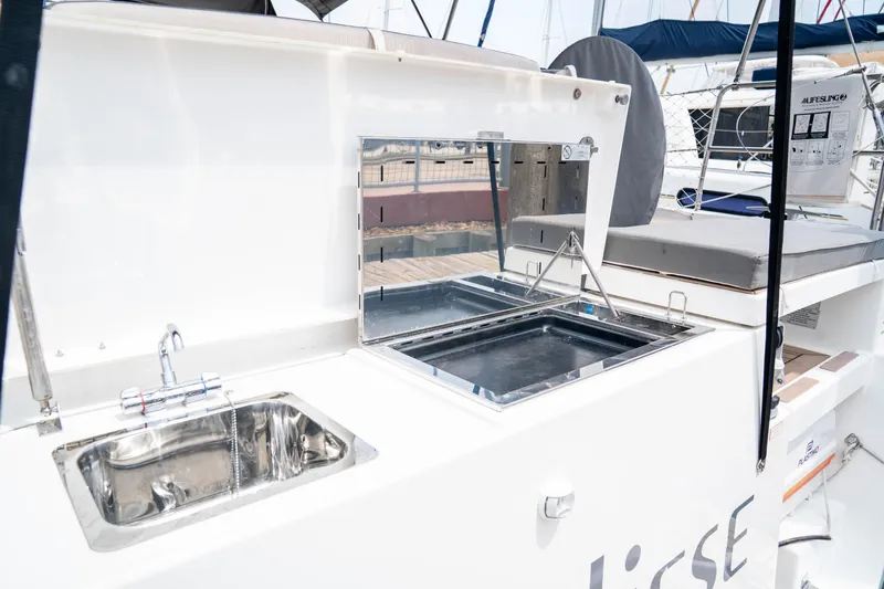  Yacht Photos Pics Outdoor kitchen on 2023 Dufour 530 yacht with sink and grill.