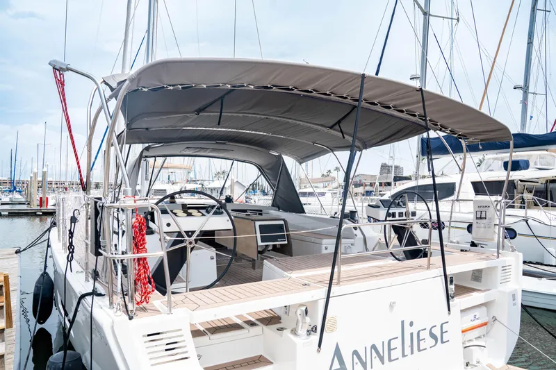  Yacht Photos Pics 2023 Dufour 530 yacht docked at marina, featuring spacious cockpit and modern design.