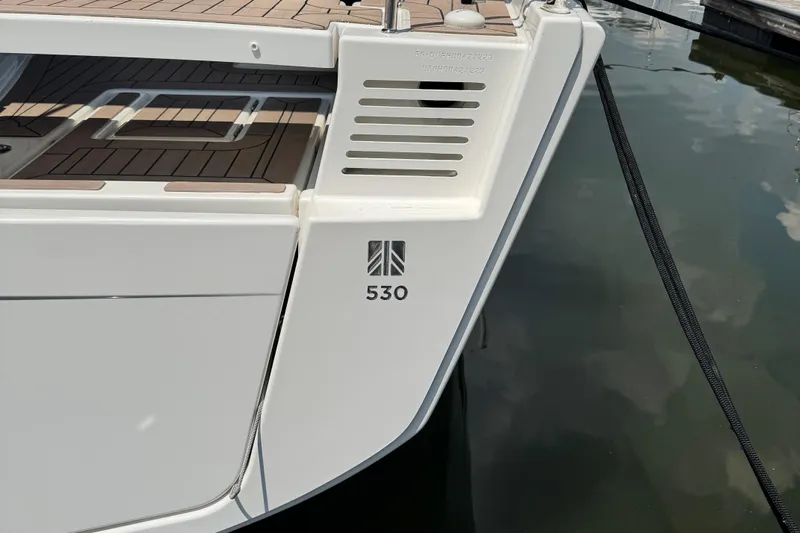  Yacht Photos Pics 2023 Dufour 530 yacht stern with sleek design and modern detailing.
