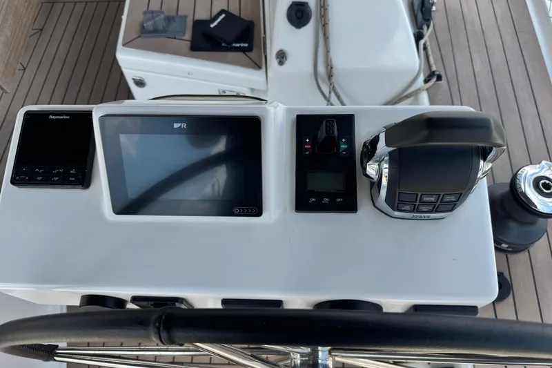 Yacht Photos Pics Control panel of 2023 Dufour 530 yacht with navigation and throttle systems.