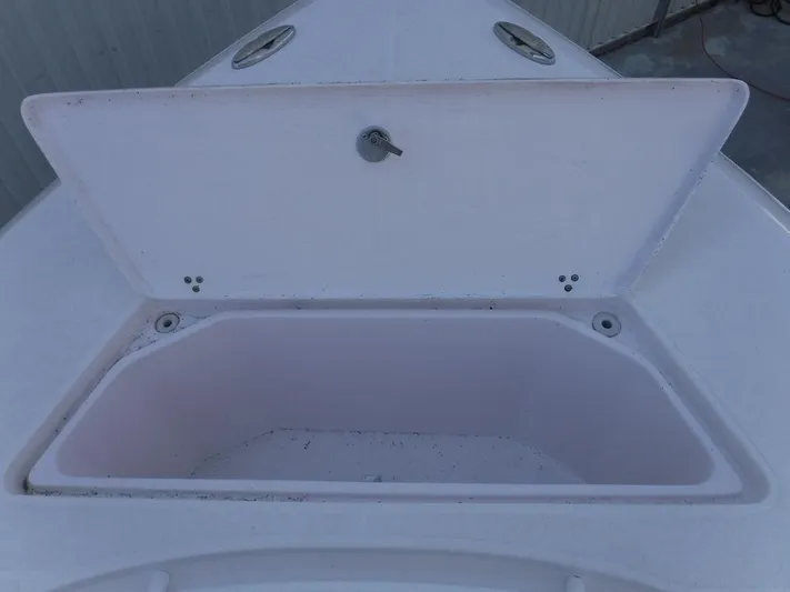  Yacht Photos Pics Open storage compartment on 2018 Fountain 34CC boat deck.