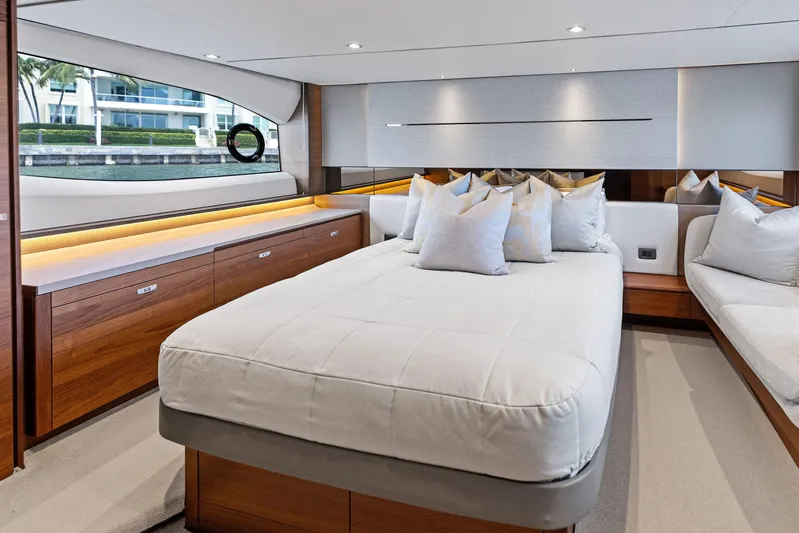 Endless Summer Yacht Photos Pics Luxurious interior of 2020 Princess V55 yacht with elegant bedroom design.