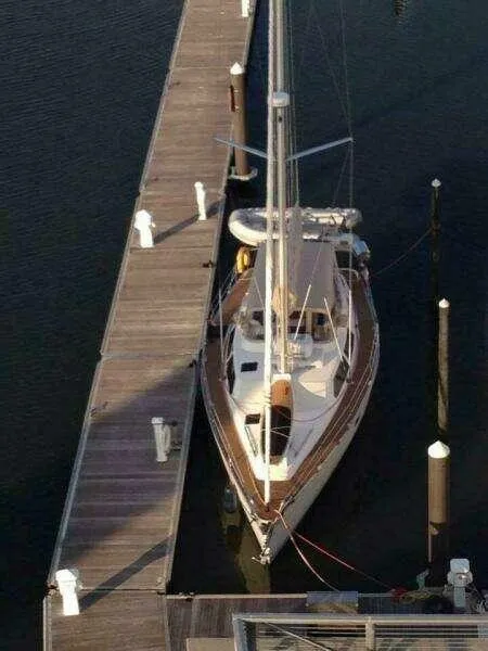 Hunter Passage 42 sailboat from 1991 docked at a marina.