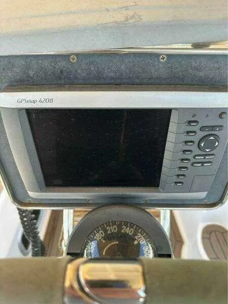 GPS navigation system and compass on a 1991 Hunter Passage 42 sailboat.