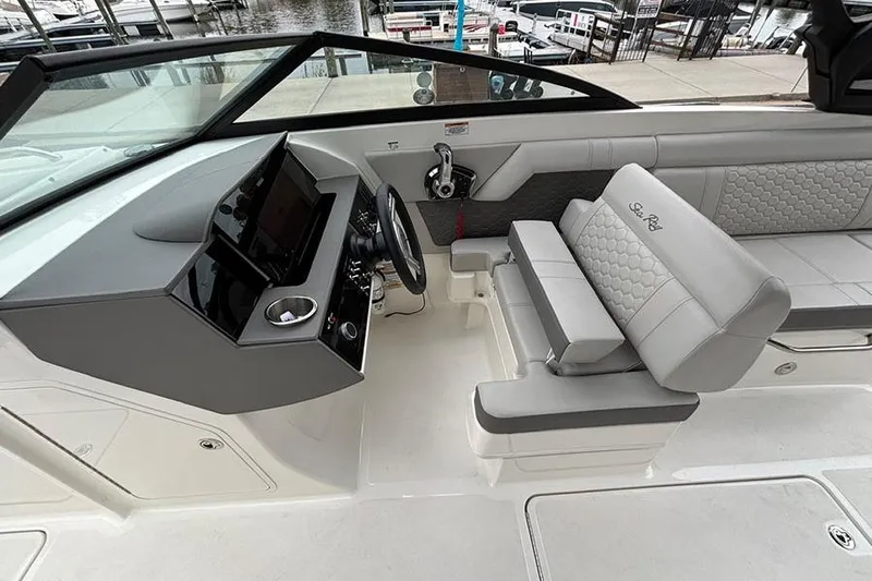  Yacht Photos Pics 2023 Sea Ray SDX 270 Outboard boat interior with modern helm and seating.