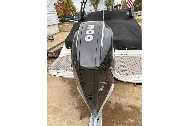  Yacht Photos Pics 2023 Sea Ray SDX 270 Outboard with powerful 300 HP engine, docked outdoors.