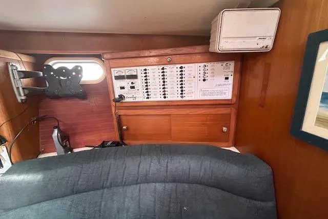 Otter Yacht Photos Pics Interior of 2000 Catalina 42 Mk II sailboat with control panel and window.