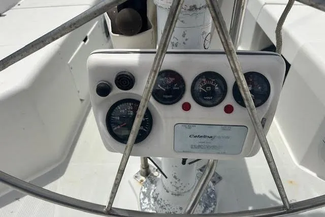 Otter Yacht Photos Pics Control panel of a 2000 Catalina 42 Mk II sailboat, featuring gauges and dials.
