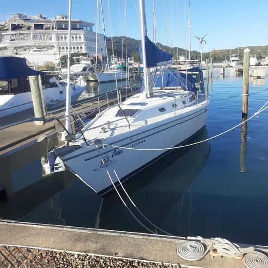 Otter Yacht Photos Pics 2000 Catalina 42 Mk II sailboat docked in a marina.