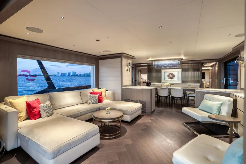 Our Trade Yacht Photos Pics Luxurious interior of 2021 Sirena 88 yacht with elegant seating and ocean view.