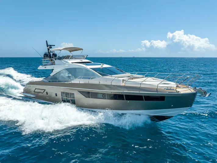  Yacht Photos Pics Azimut S7 2018 yacht cruising on open sea under clear blue sky.