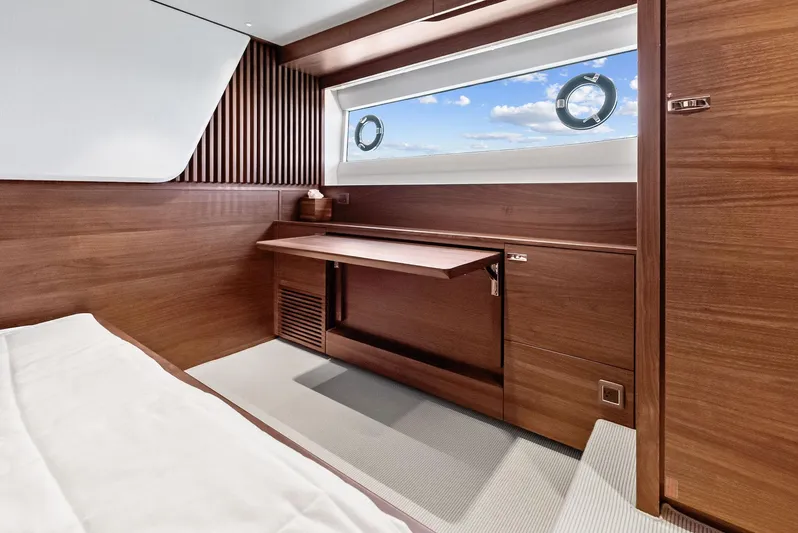 Seaquel Yacht Photos Pics Luxurious interior of 2024 Princess Y72 Motor Yacht with elegant wood finish and ocean view.