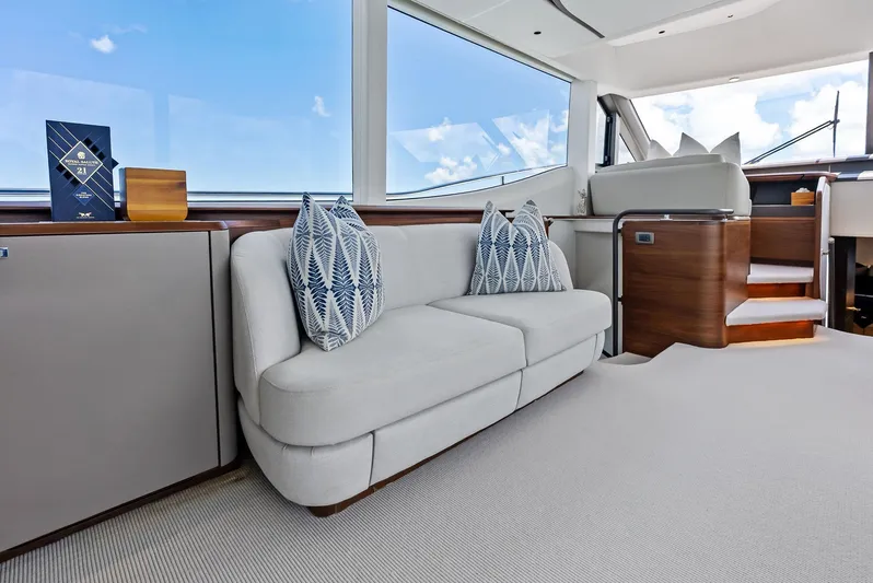 Seaquel Yacht Photos Pics Luxurious interior of 2024 Princess Y72 Motor Yacht with elegant seating and decor.